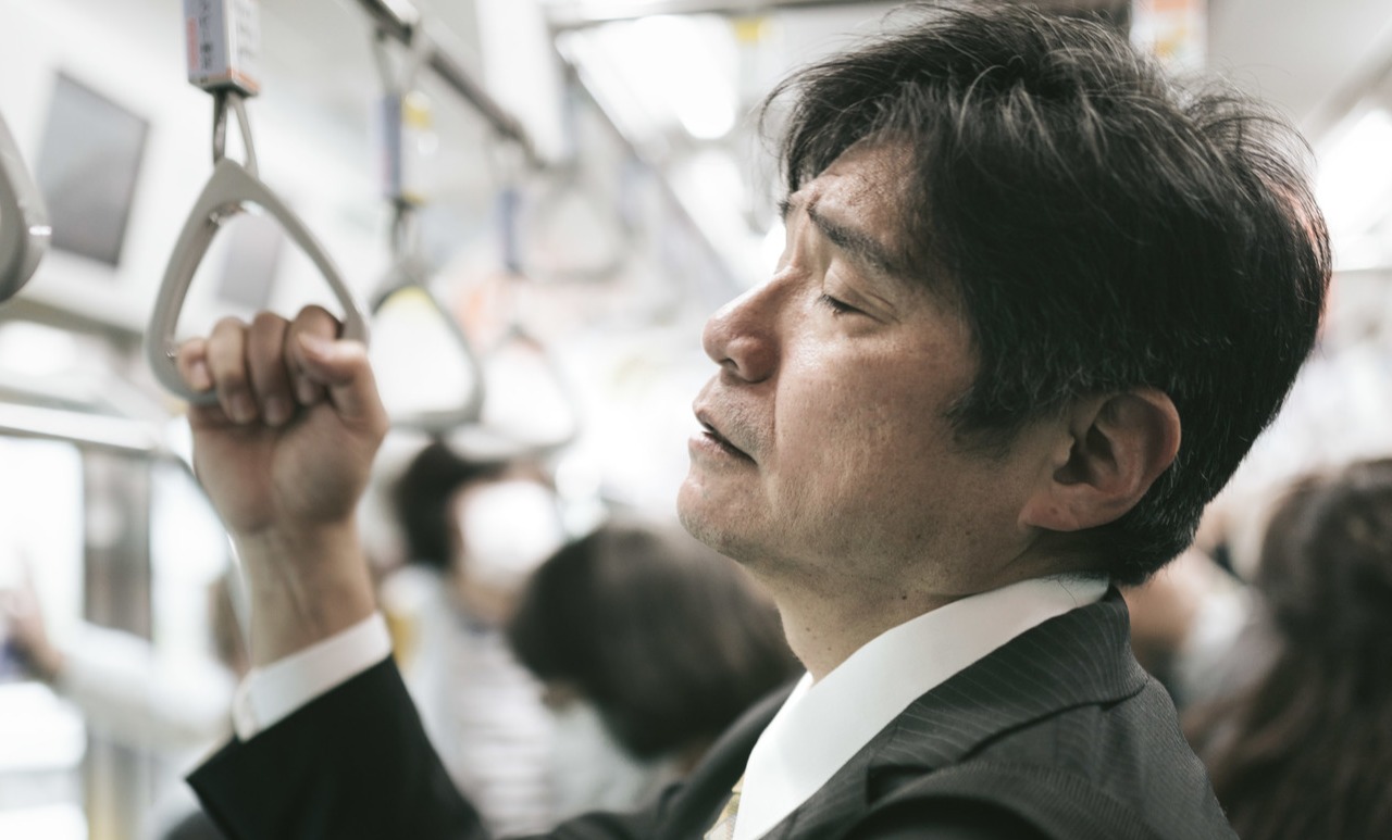 疲れた中年男性