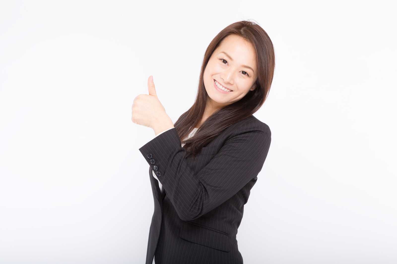 褒めるスーツの女性